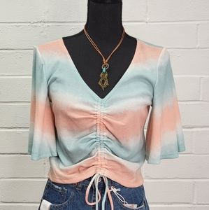 All Peachy Vibes Top in Turquoise and peachy wave pattern